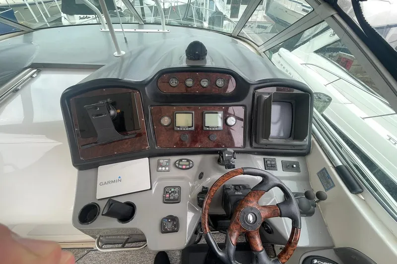Slide: The Image of 2005 Cruisers Yachts 405 Express Motoryacht interior with seating and kitchenette. - 6