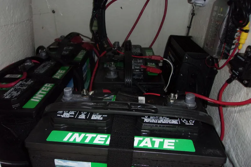 Slide: The Image of Batteries and wiring inside a 2022 Key West 1720 Sportsman boat. - 17