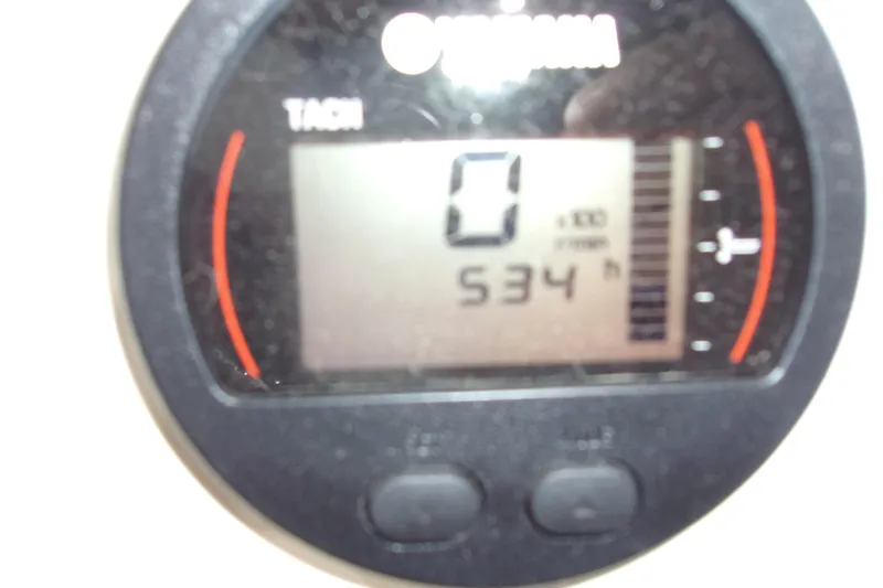 Slide: The Image of Close-up of a Yamaha tachometer displaying 534 hours on a 2022 Key West 1720 Sportsman. - 19
