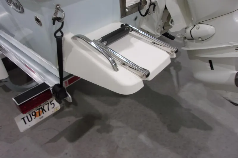 Slide: The Image of 2022 Key West 1720 Sportsman boat with swim platform and ladder. - 23