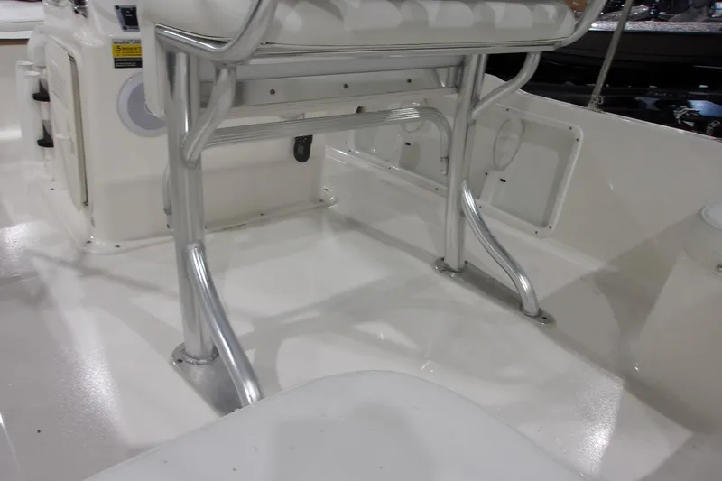 Slide: The Image of 2022 Key West 1720 Sportsman boat interior with aluminum seating and white deck. - 24
