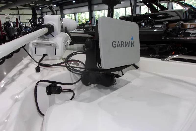 Slide: The Image of 2022 Key West 1720 Sportsman boat with Garmin navigation system in showroom. - 26