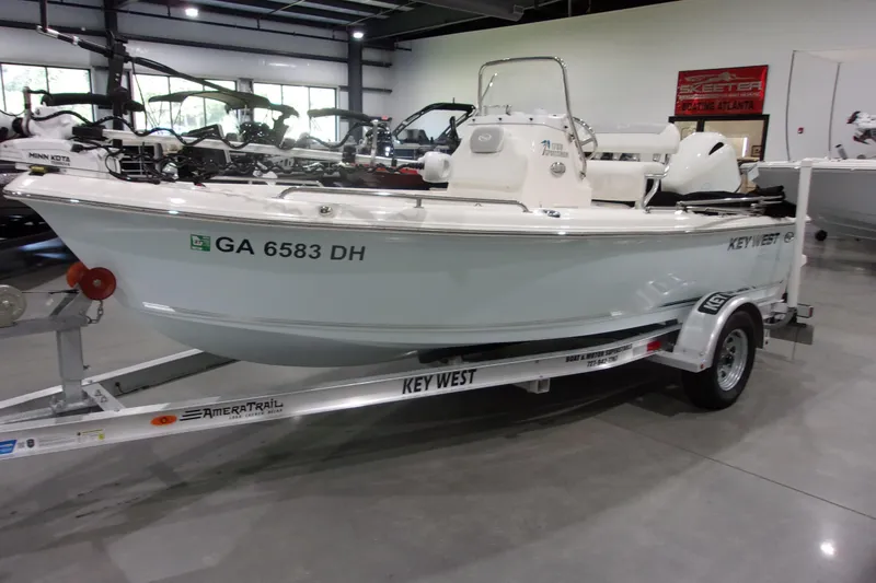 Slide: The Image of 2022 Key West 1720 Sportsman boat on trailer in showroom. - 3
