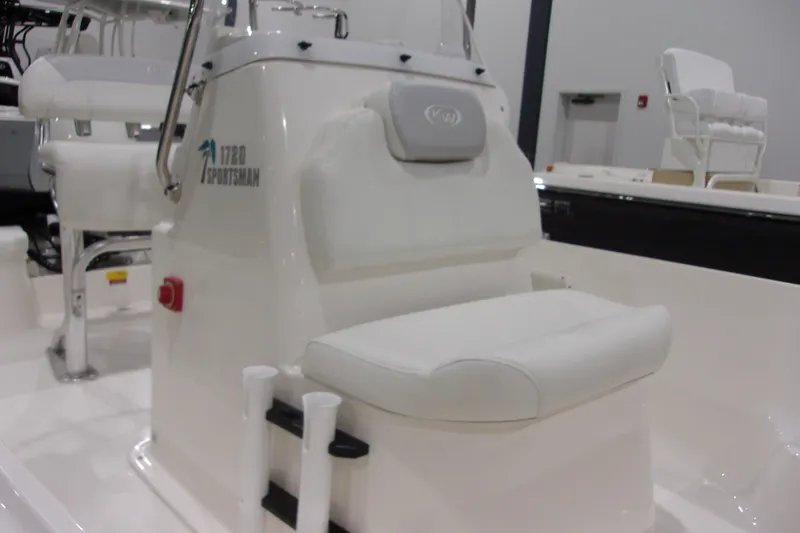 Slide: The Image of 2022 Key West 1720 Sportsman boat interior with white seating and console. - 8