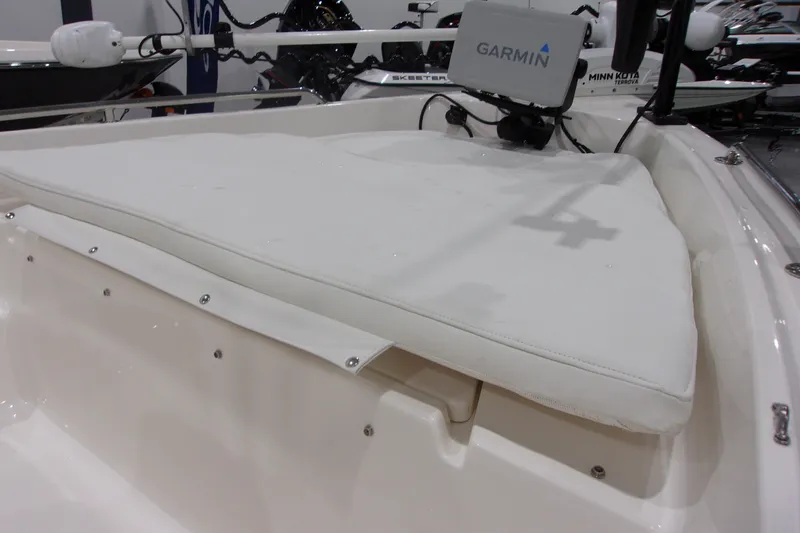 Slide: The Image of 2022 Key West 1720 Sportsman boat with Garmin navigation system and cushioned seating. - 9