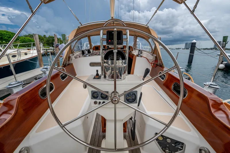 Slide: The Image of Hinckley Sou'wester Stoway Sloop 2000 yacht cockpit with steering wheel and navigation instruments. - 30