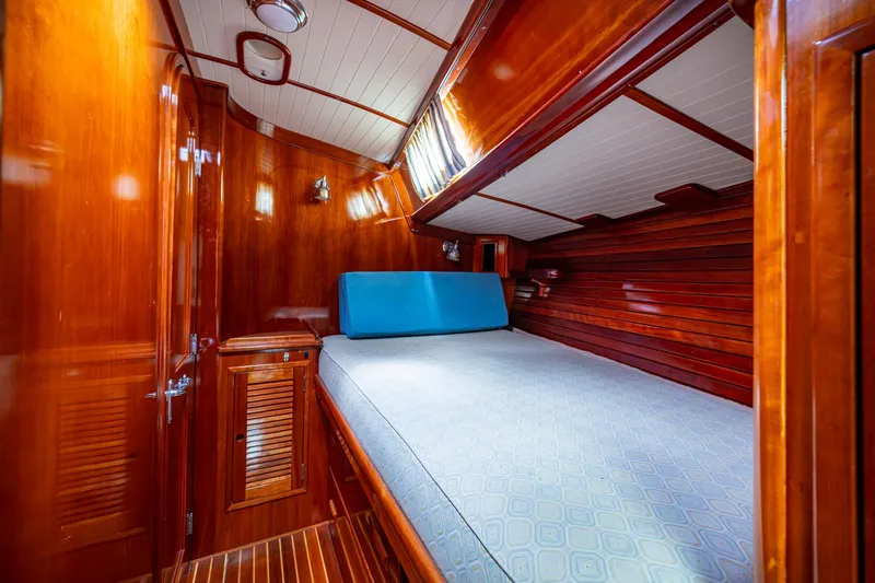 Slide: The Image of Luxurious wooden cabin interior of 2000 Hinckley Sou'wester Stoway Sloop yacht. - 54