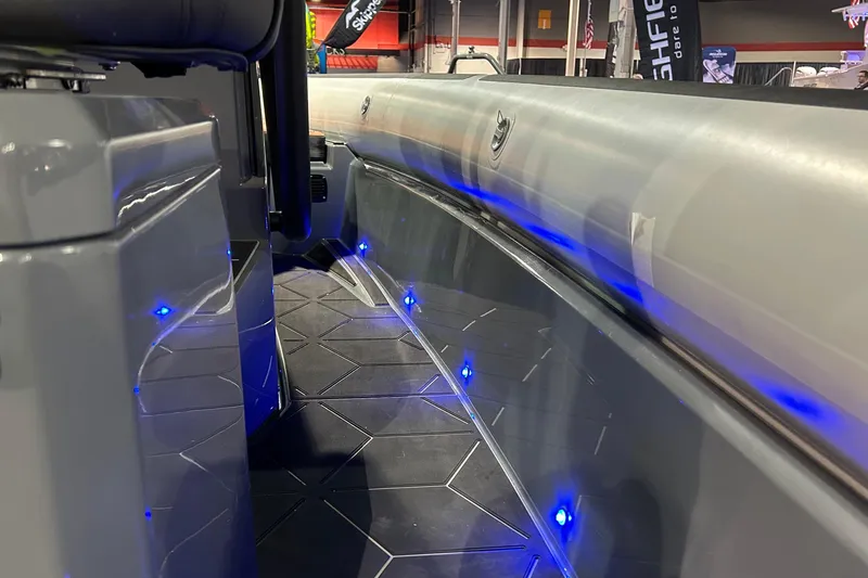 Slide: The Image of 2026 Highfield ADV 7 boat interior with blue LED lights and sleek design. - 15