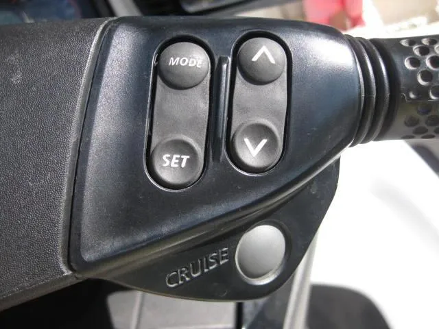 Slide: The Image of Control panel of 2014 Sea-Doo Wake Pro 215 with mode and cruise buttons. - 11