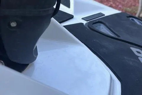 Slide: The Image of 2014 Sea-Doo Wake Pro 215 jet ski close-up, showcasing sleek design details. - 14