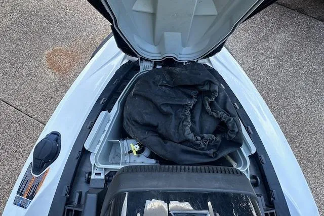 Slide: The Image of 2014 Sea-Doo Wake Pro 215 storage compartment with cover inside. - 15