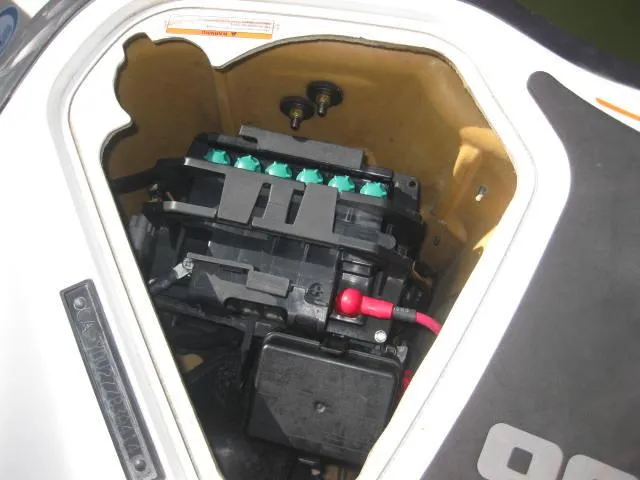 Slide: The Image of 2014 Sea-Doo Wake Pro 215 engine compartment, showcasing internal components and wiring. - 18