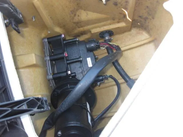 Slide: The Image of 2014 Sea-Doo Wake Pro 215 engine compartment with visible wiring and components. - 19