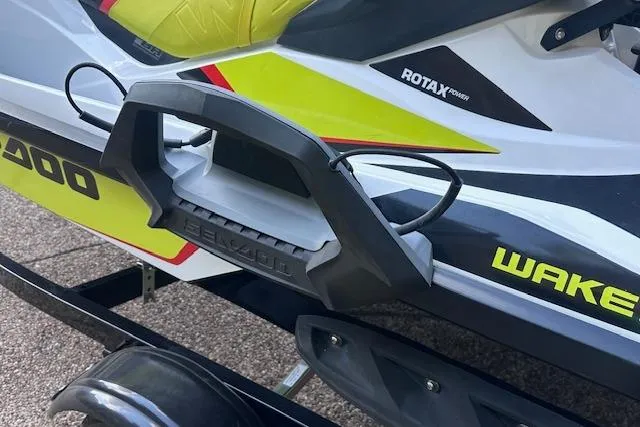 Slide: The Image of 2014 Sea-Doo Wake Pro 215 jet ski with Rotax engine, featuring vibrant yellow and black design. - 21