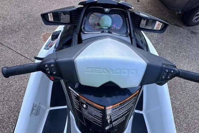 Slide: The Image of 2014 Sea-Doo Wake Pro 215 jet ski dashboard and handlebars, top view. - 4