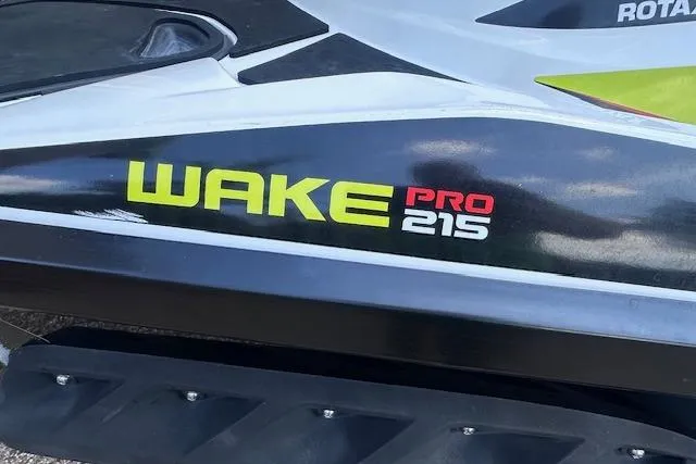 Slide: The Image of 2014 Sea-Doo Wake Pro 215 jet ski, close-up of model branding. - 6