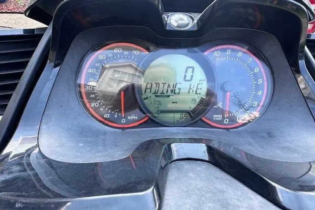 Slide: The Image of 2014 Sea-Doo Wake Pro 215 dashboard with speedometer and digital display. - 7