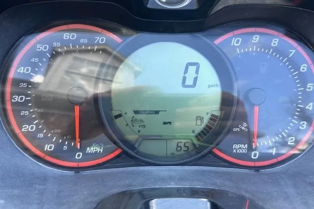 Slide: The Image of 2014 Sea-Doo Wake Pro 215 dashboard displaying speedometer and RPM gauges. - 9