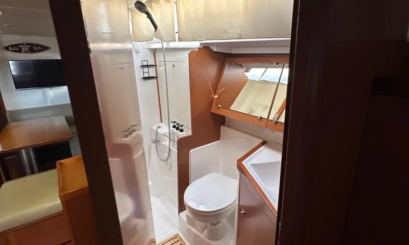 Slide: The Image of Interior of 2014 Beneteau Oceanis 41 yacht bathroom with shower and toilet. - 9