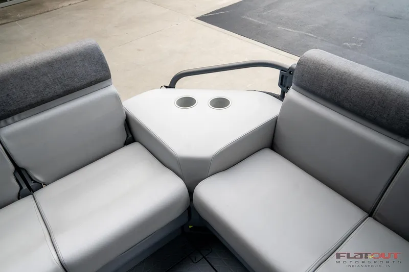 Slide: The Image of 2024 Sea-Doo Switch SPORT 21 interior seating with cup holders, showcasing modern design. - 11