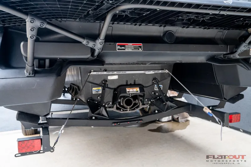 Slide: The Image of 2024 Sea-Doo Switch SPORT 21 230HP rear view, showcasing trailer and engine components. - 6