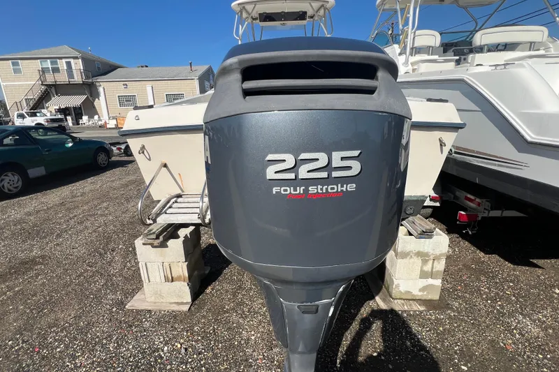 Slide: The Image of 1983 Grady-White boat with 225 four-stroke outboard engine on display. - 4