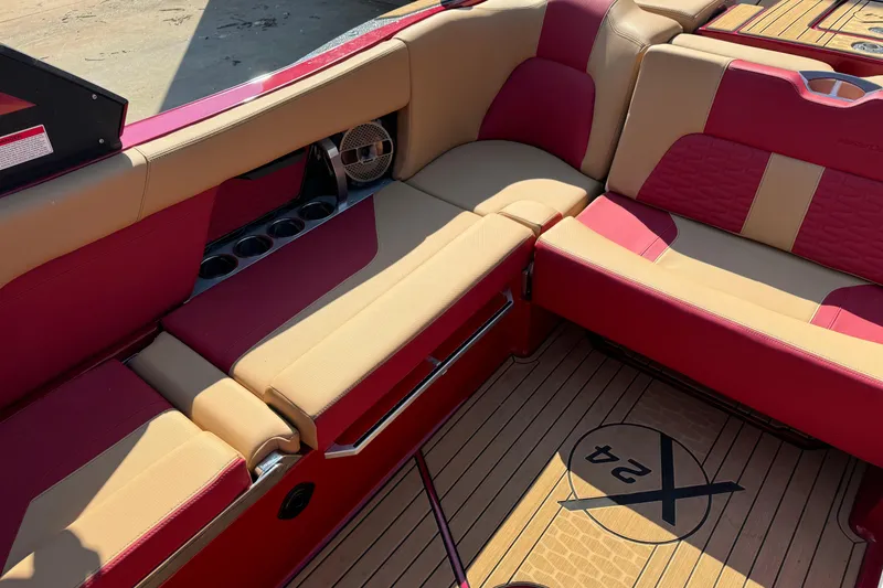 Slide: The Image of Luxurious interior of 2022 MasterCraft X24 boat with red and beige seating. - 14