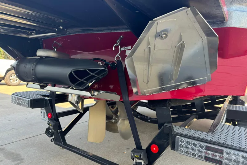 Slide: The Image of 2022 MasterCraft X24 boat stern with propeller and exhaust system. - 5