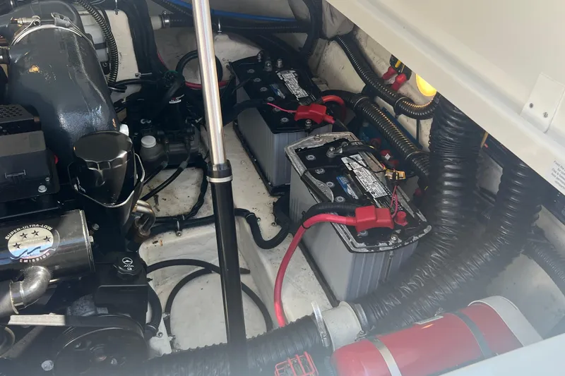 Slide: The Image of Engine compartment of a 2018 Formula 270 Sun Sport with visible batteries and wiring. - 28