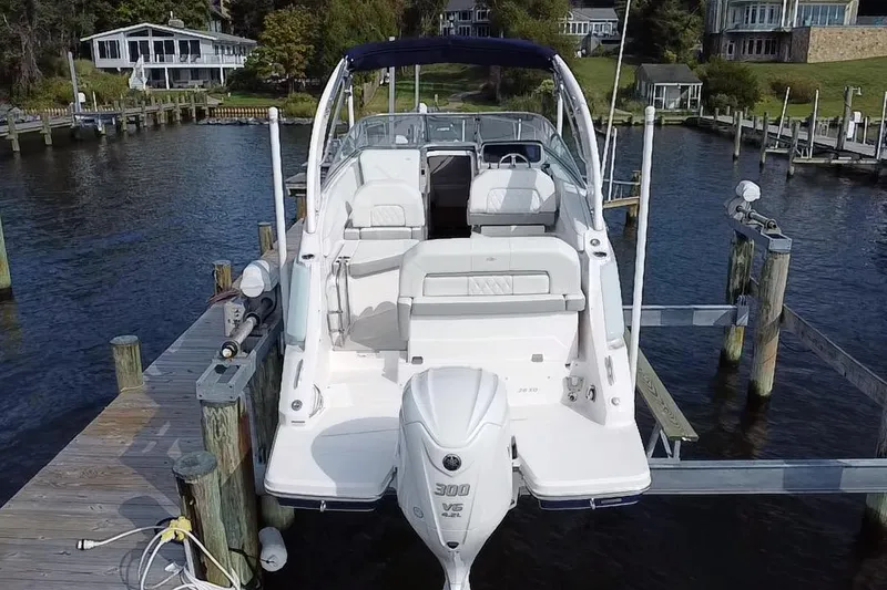 Slide: The Image of 2024 Regal 26 XO boat on display, featuring sleek design and modern amenities. - 4