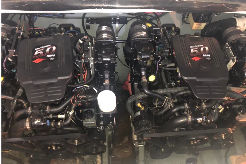 Slide: The Image of Twin MerCruiser 5.0 MPI engines in a 2004 Sea Ray 280 Sundancer boat. - 25
