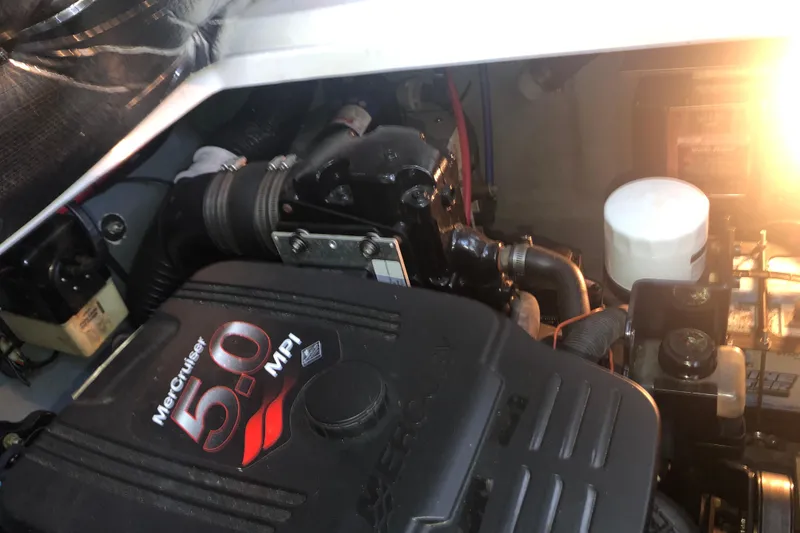 Slide: The Image of Engine compartment of a 2004 Sea Ray 280 Sundancer with MerCruiser 5.0 MPI engine. - 26