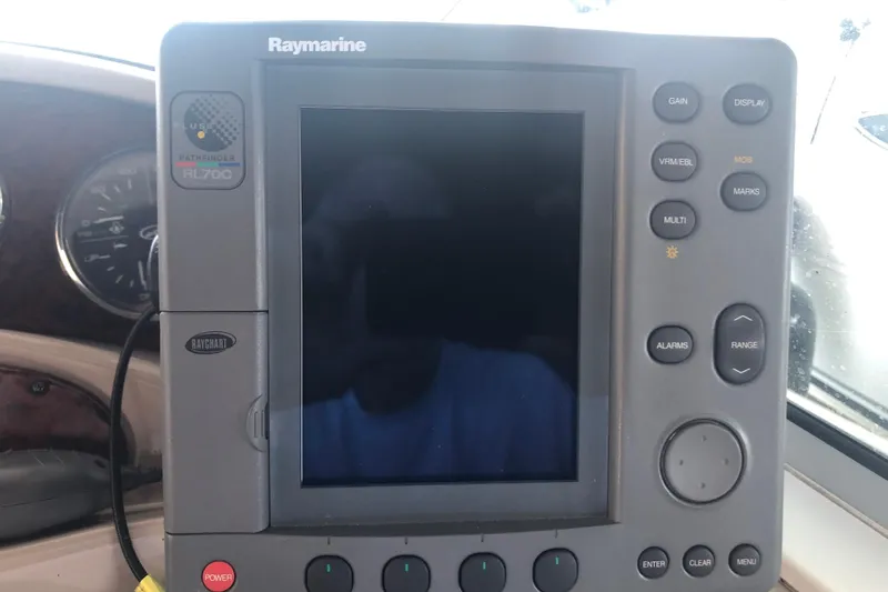 Slide: The Image of Raymarine Pathfinder RL70C display on 2004 Sea Ray 280 Sundancer boat dashboard. - 28