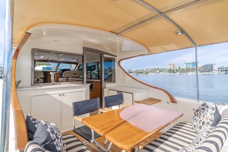 Slide: The Image of Luxurious 2015 Palm Beach Motor Yachts 45 Sedan with elegant interior and waterfront view. - 2