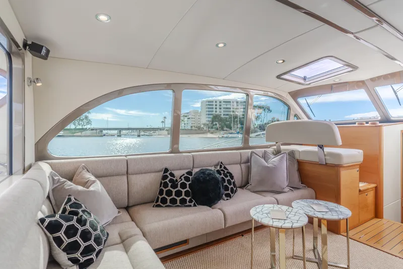 Slide: The Image of Luxurious interior of 2015 Palm Beach Motor Yachts 45 Sedan with waterfront view. - 43