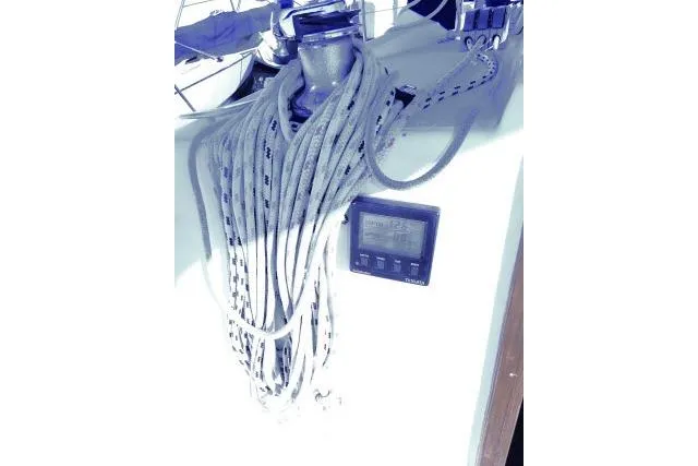 Slide: The Image of Sailing equipment on a 1995 Tartan 3100 yacht with ropes and a digital display. - 27