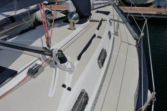 Slide: The Image of Deck view of a 1995 Tartan 3100 sailboat with rigging and winches. - 33