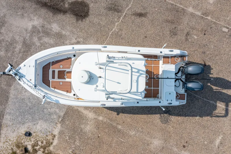 Slide: The Image of Overhead view of 2011 Sea Hunt Gamefish 25 boat on concrete surface. - 9