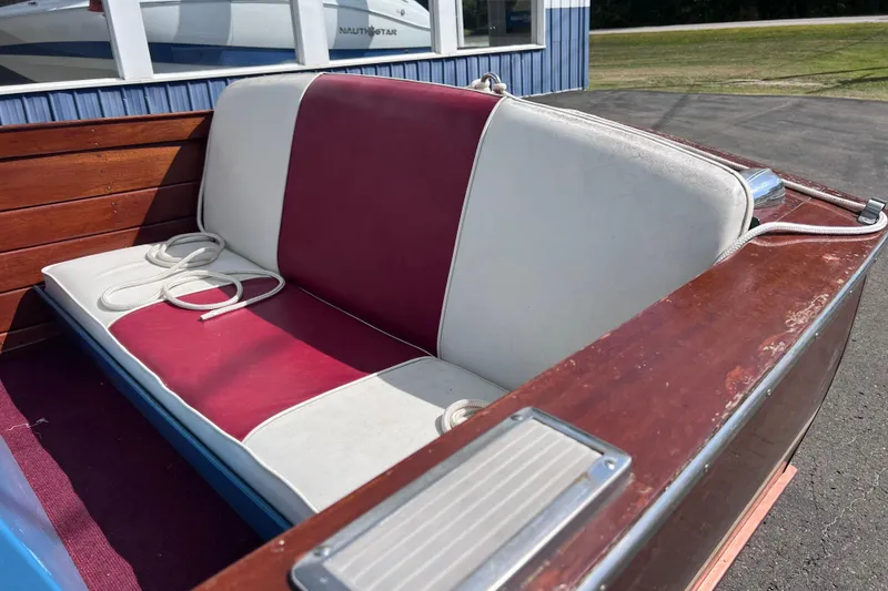 Slide: The Image of 1955 Chris-Craft 17 Cavalier boat interior with red and white seating. - 8
