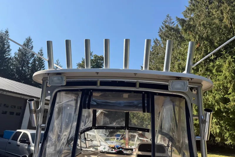 Slide: The Image of Yamaha 9.9 High Thrust outboard motor on 2006 Grady-White Seafarer 228 boat. - 12