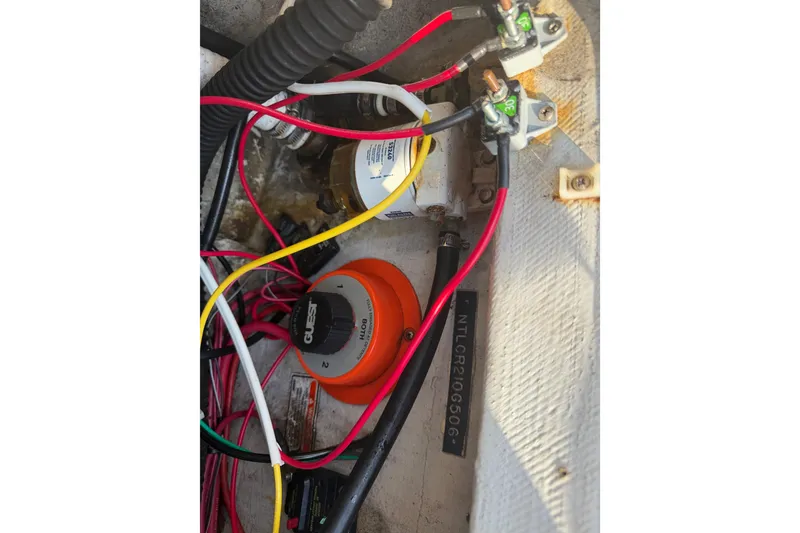 Slide: The Image of Captain's chair in 2006 Grady-White Seafarer 228 boat cockpit, with window view. - 21