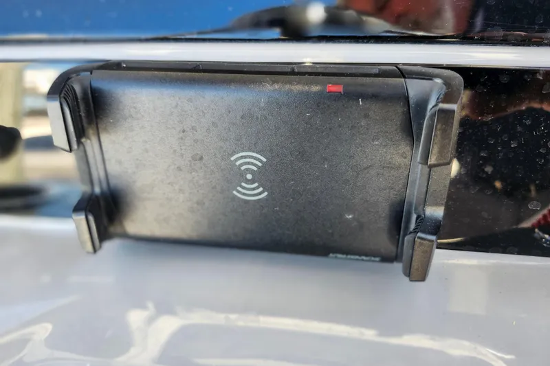 Slide: The Image of Wireless charging pad on 2023 Robalo R230 Center Console boat. - 19