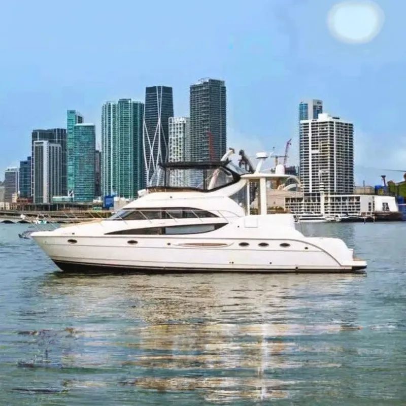 The Image of 2007 Meridian 459 Motoryacht on clear blue water, aerial view. - 0