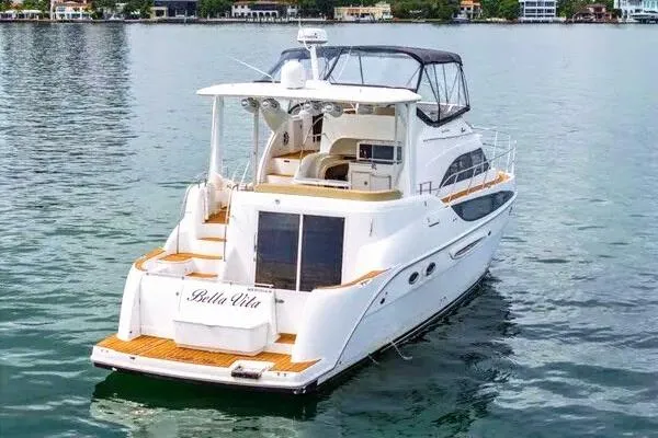 Slide: The Image of Luxurious interior of 2007 Meridian 459 Motoryacht with elegant wood finishes and modern amenities. - 13