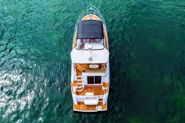 Slide: The Image of Luxurious interior of a 2007 Meridian 459 Motoryacht with elegant seating and decor. - 15