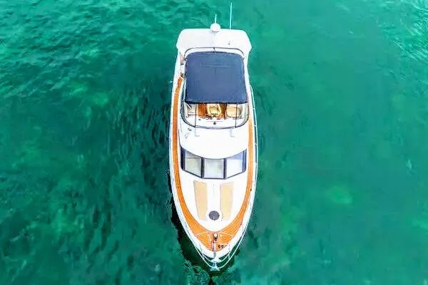 Slide: The Image of Luxurious interior of 2007 Meridian 459 Motoryacht with leather seating and nautical decor. - 17