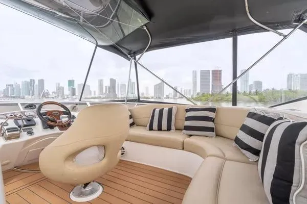 Slide: The Image of 2007 Meridian 459 Motoryacht deck with city skyline in background. - 25