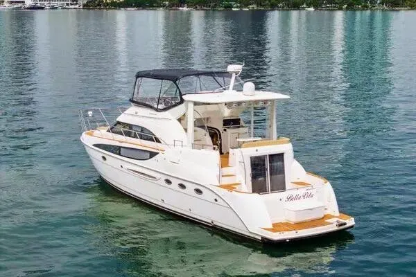 Slide: The Image of 2007 Meridian 459 Motoryacht on clear blue water, aerial view. - 8