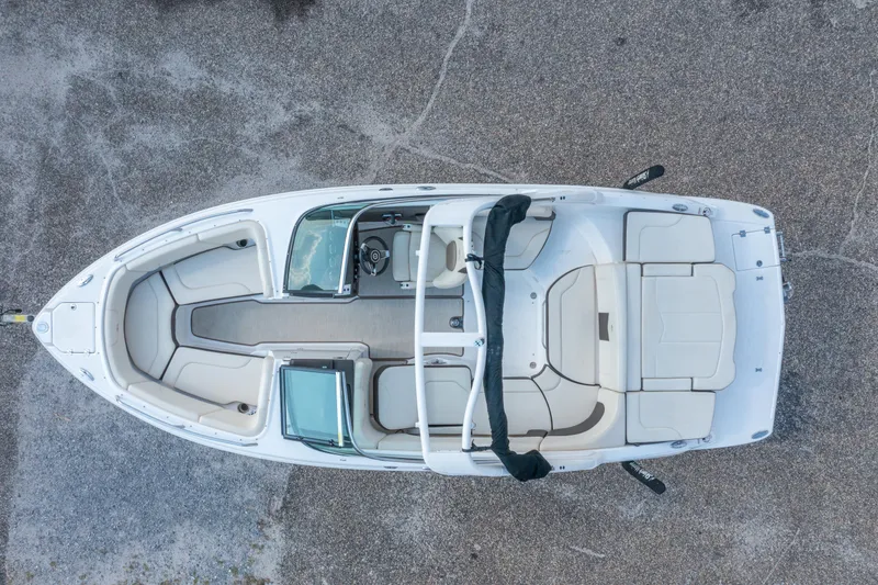 Slide: The Image of 2021 Chaparral 237 SSX boat, aerial view, showcasing spacious seating and sleek design. - 10