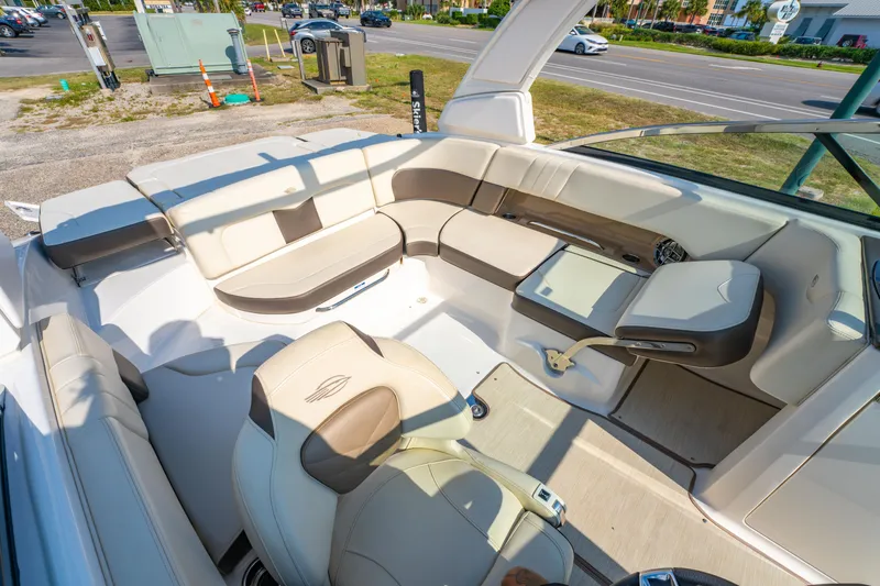Slide: The Image of Interior of 2021 Chaparral 237 SSX boat with beige seating and modern design. - 17